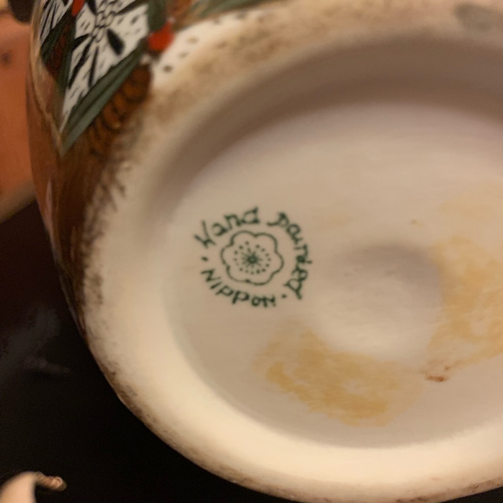 Artistic Ceramic Vase with Floral Design